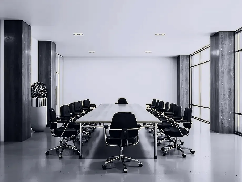 A boardroom set for sixteen, columns and floor-to-ceiling windows on the city.
