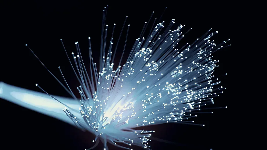 Light carried through a bundle of optical fibres.